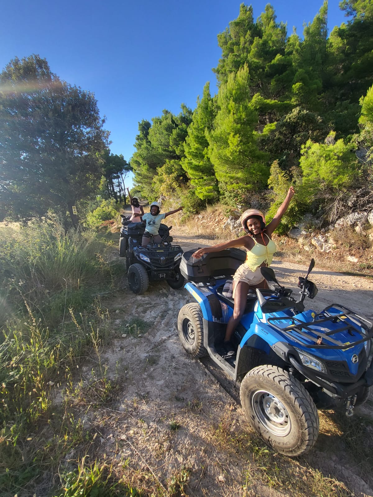 tree quads driving on dirt road in makarska with makarska adventure